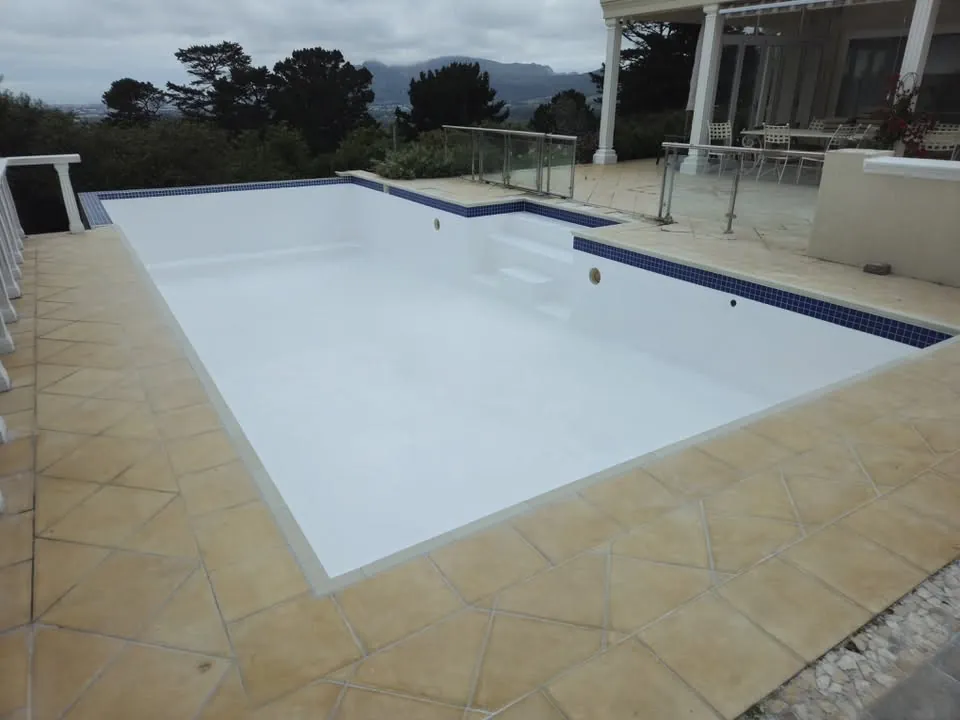 Hillside pool resurfacing: steps and waterline