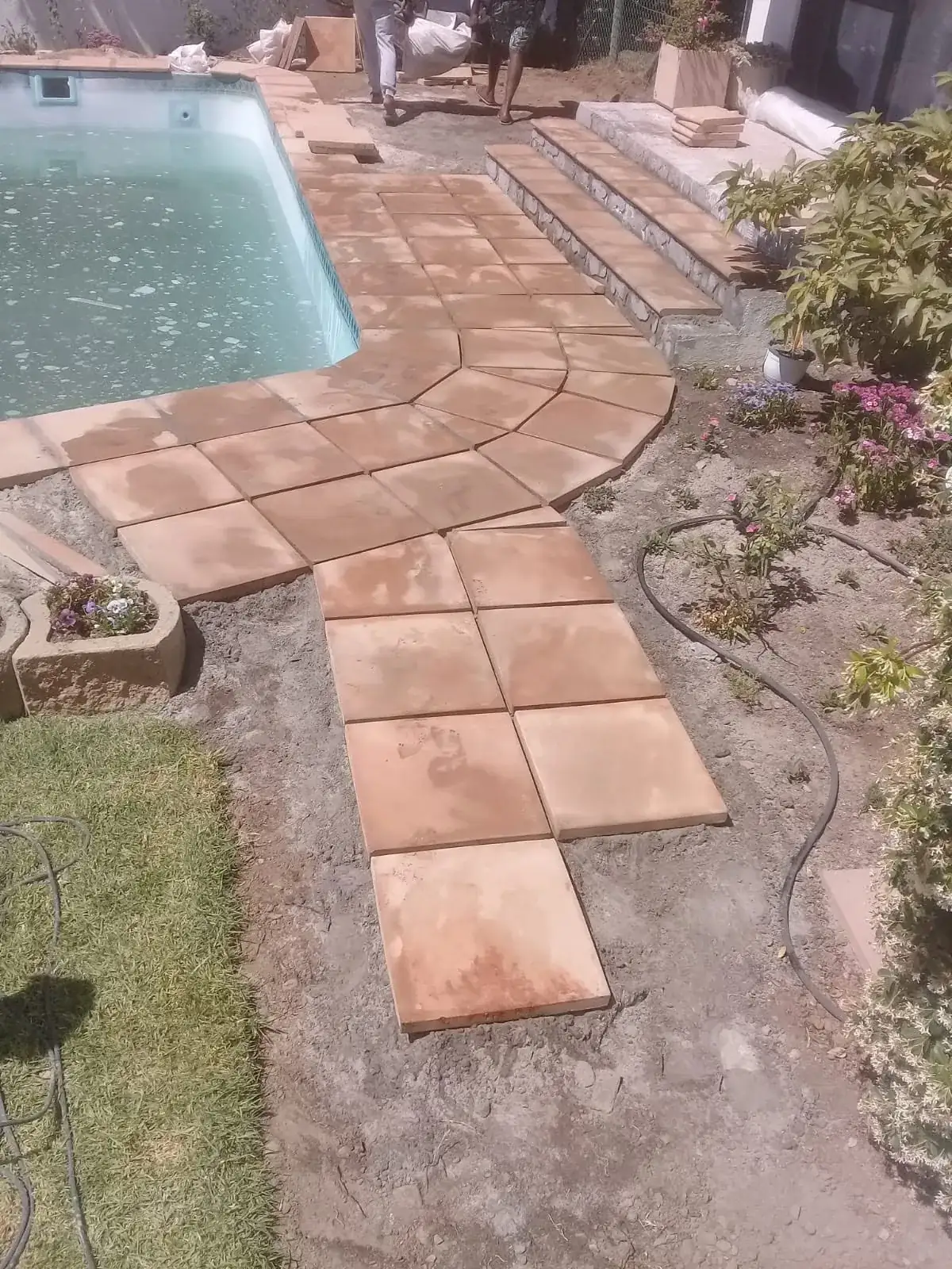 Pool surround makeover: New paving going down