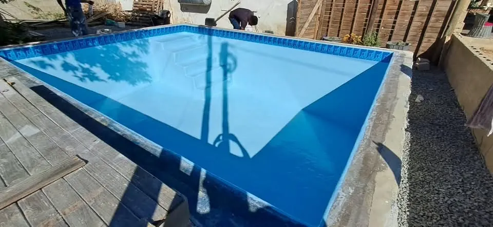 A small concrete pool, stripped and relined